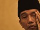20150406_101405_harianterbit_jokowi_kopiah